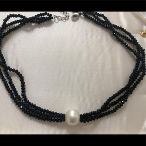 Black beaded necklace with pearl